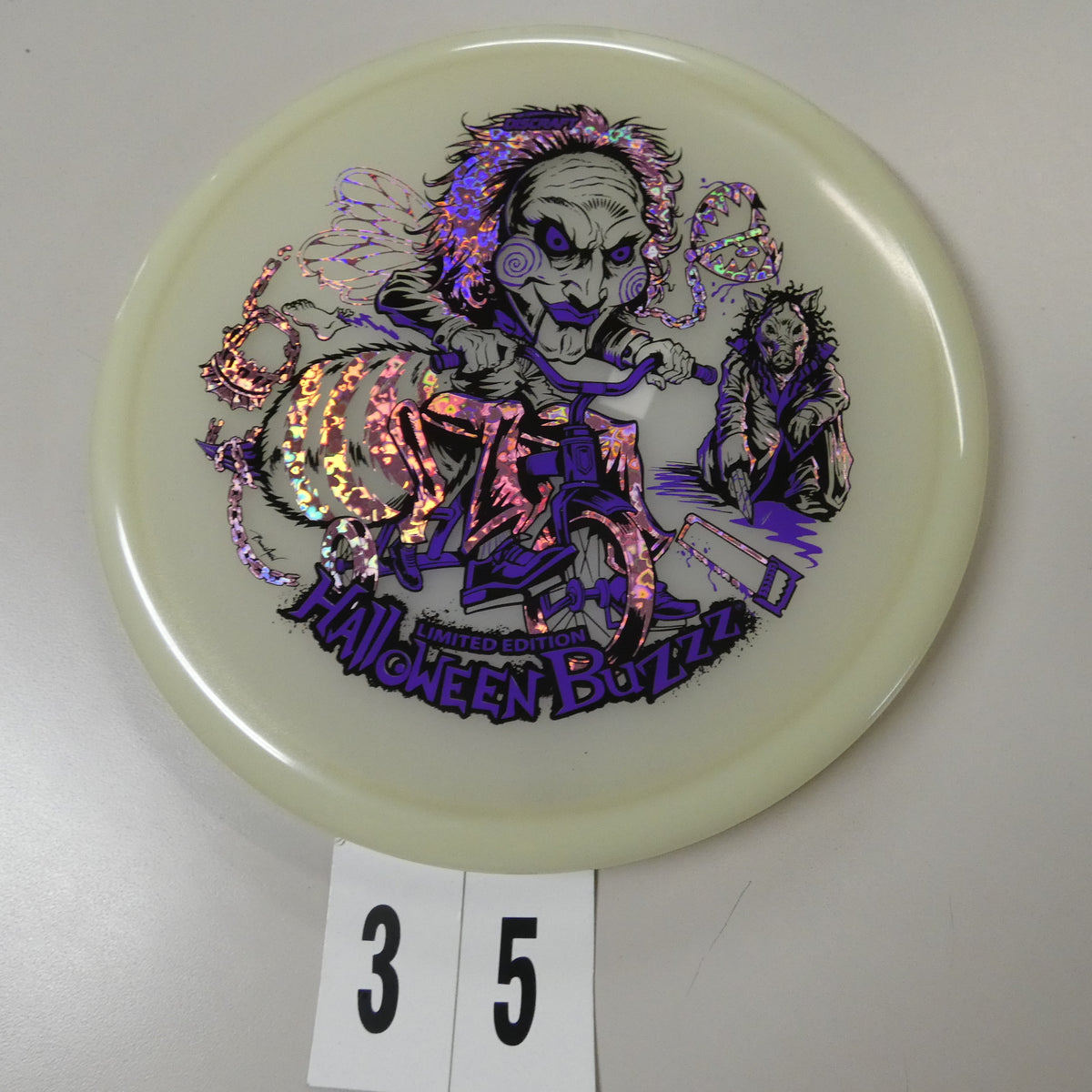 Triple Foil Mega Glo Halloween Buzzz (2026)